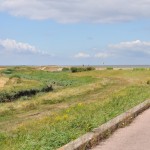 Looking back towards Reculver Towers from cycle path heading towards Margate